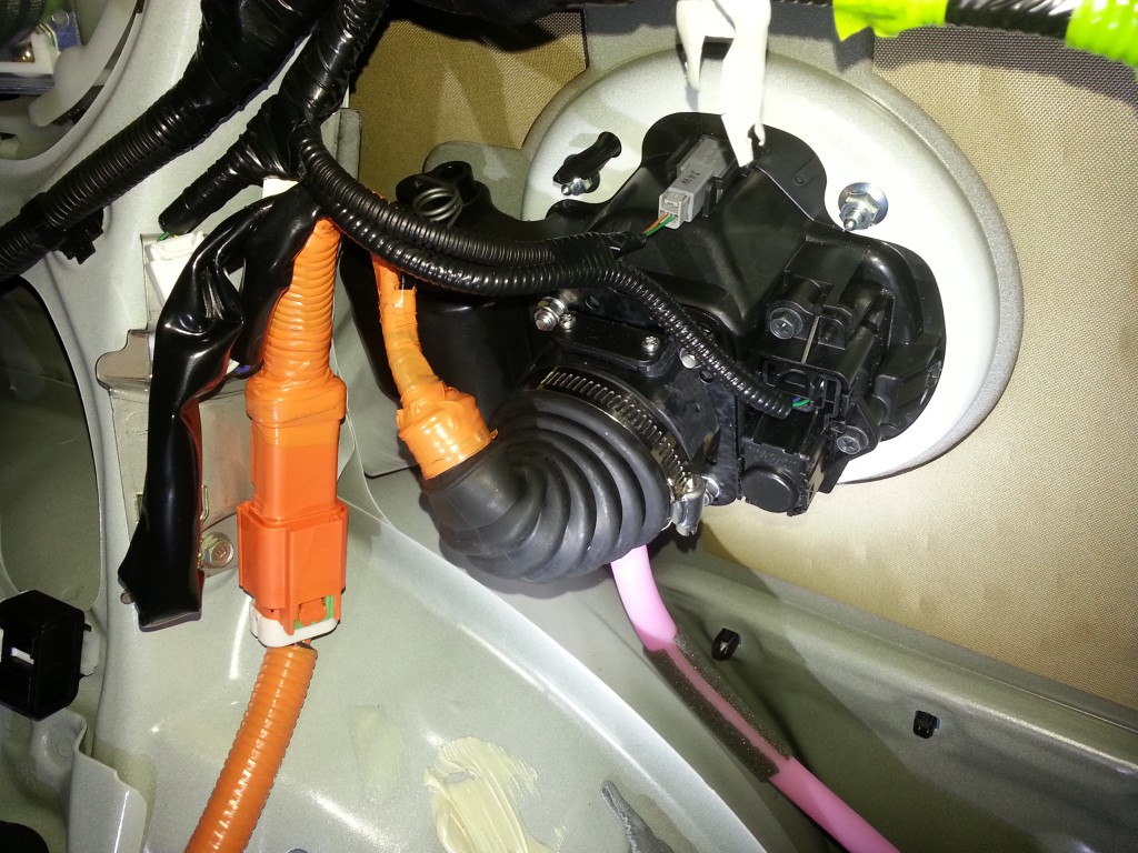 Everything reassembled. Used the original wiring harness. New reinforcement bracket partly visible.