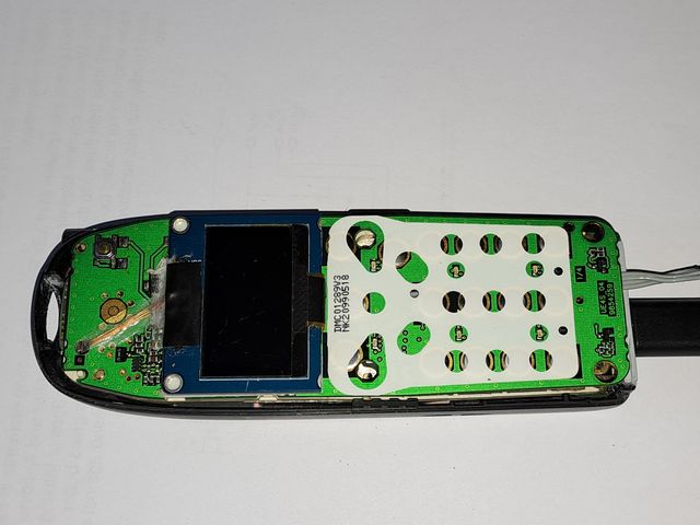 UI PCB on top of main PCB separated by inner frame.