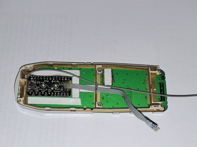 Inner housing b cover with UI PCB and separation frame.